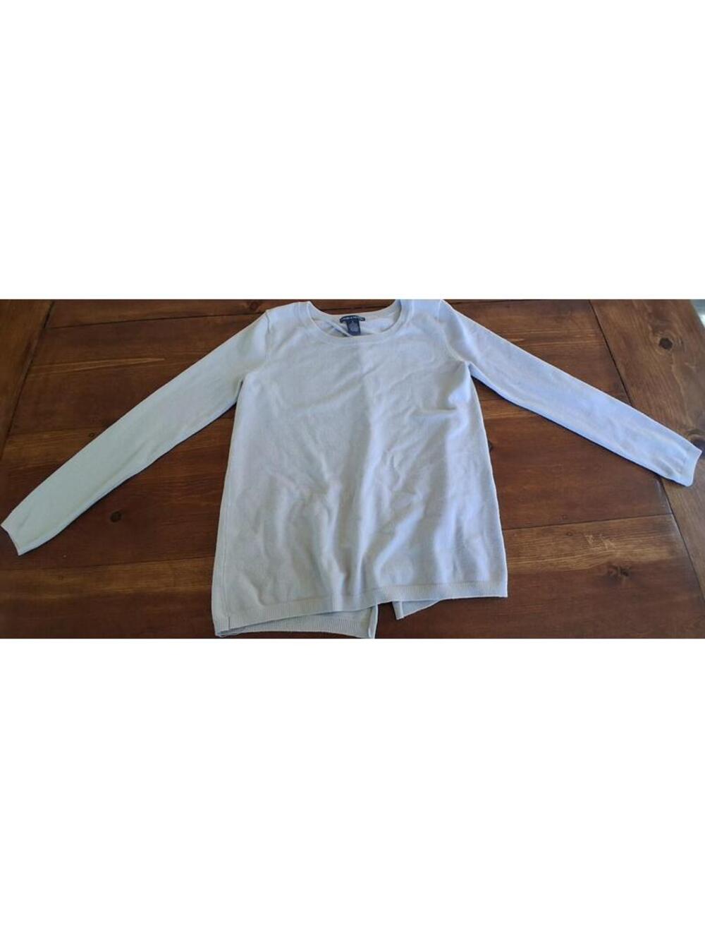 Chelsea & Theodore classic knit sweater with an open back